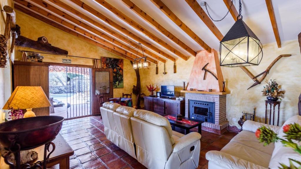 A seating area at Finca Tarabita Competa by Ruralidays