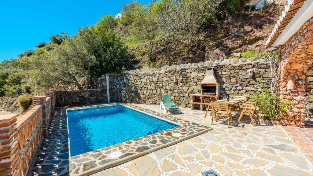 The swimming pool at or close to Finca Tarabita Competa by Ruralidays