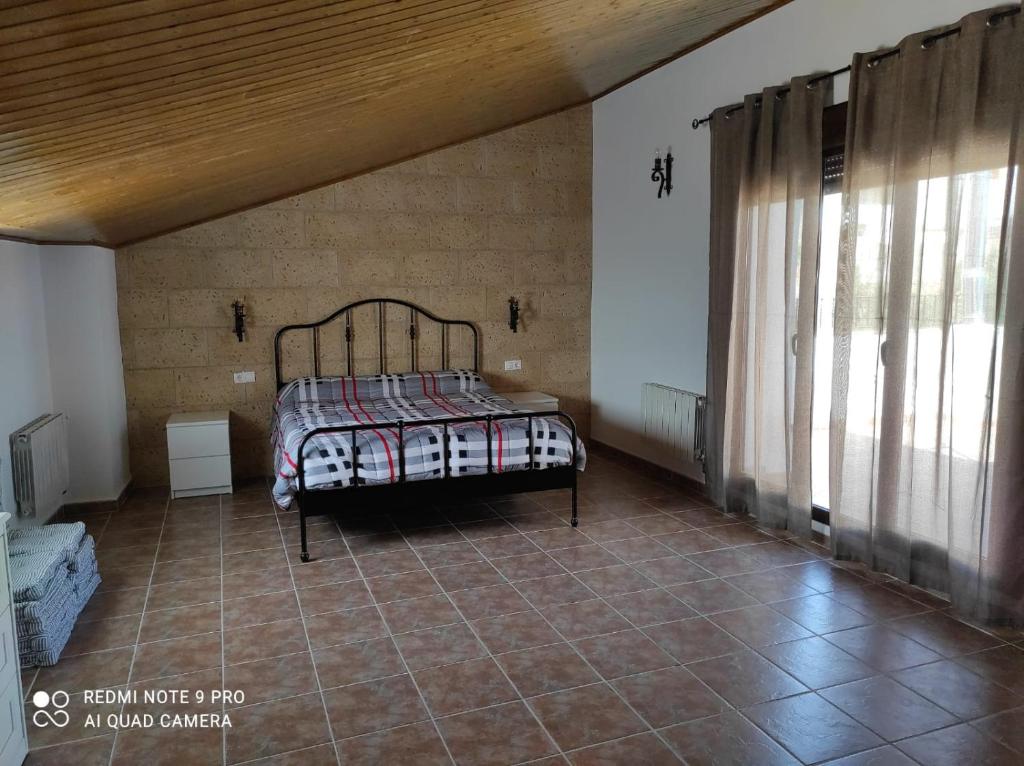 Postel nebo postele na pokoji v ubytování Alojamiento Rural MAGALAN