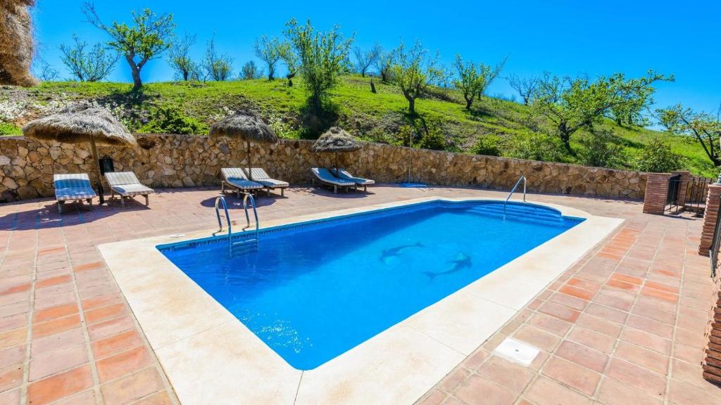 Basen w obiekcie Mansion Piedras Blancas Colmenar by Ruralidays lub w pobliżu