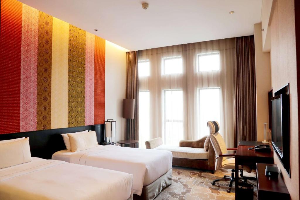 TV a/nebo společenská místnost v ubytování Radisson Blu Hotel Liuzhou