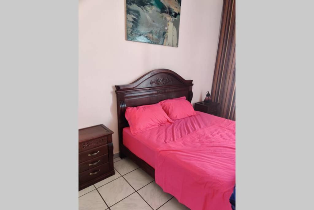 En eller flere senge i et værelse på Appartement avenue Hassan 2 guest friendly