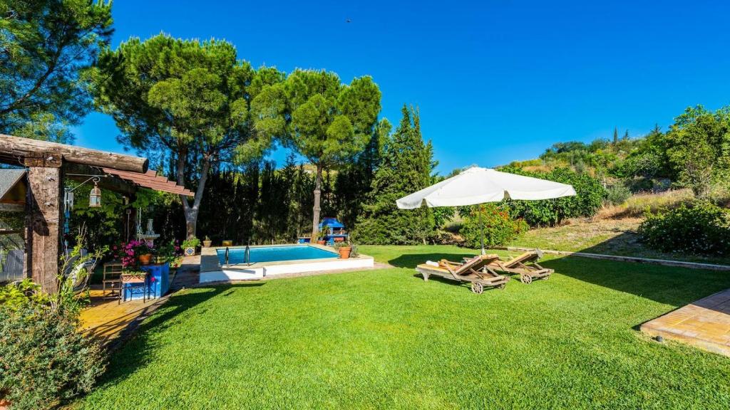 Bazén v ubytování Casa Cupiana Malaga by Ruralidays nebo v jeho okolí