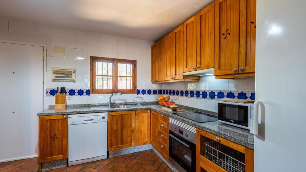 Kuchyň nebo kuchyňský kout v ubytování Casa Cupiana Malaga by Ruralidays