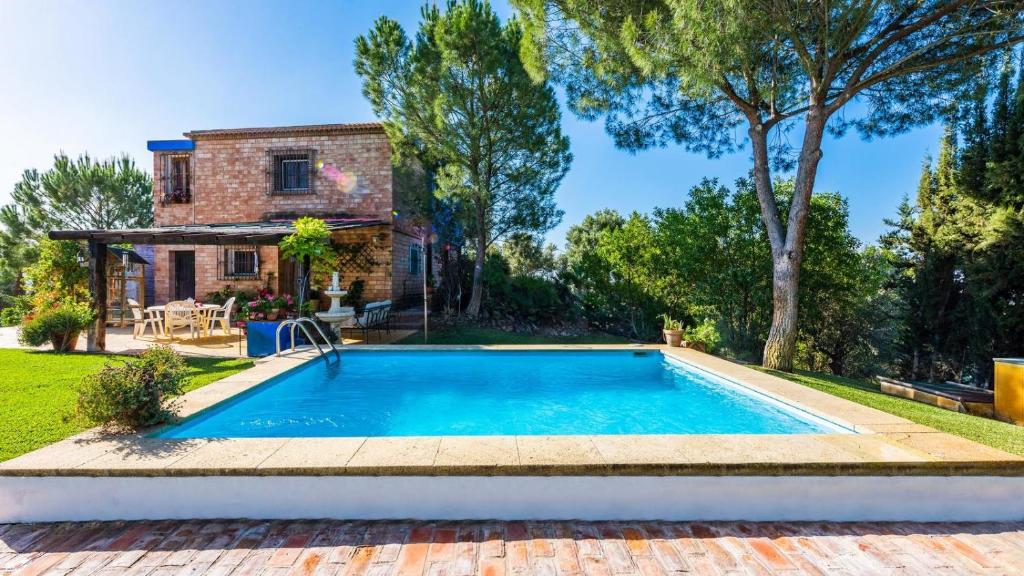 Bazén v ubytování Casa Cupiana Malaga by Ruralidays nebo v jeho okolí