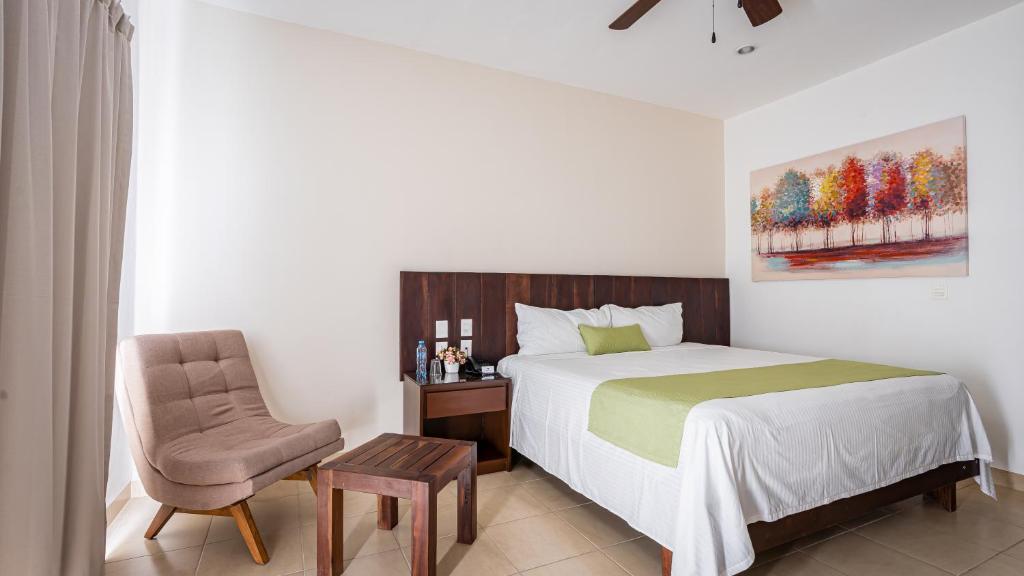Postel nebo postele na pokoji v ubytování Imperla Hotel