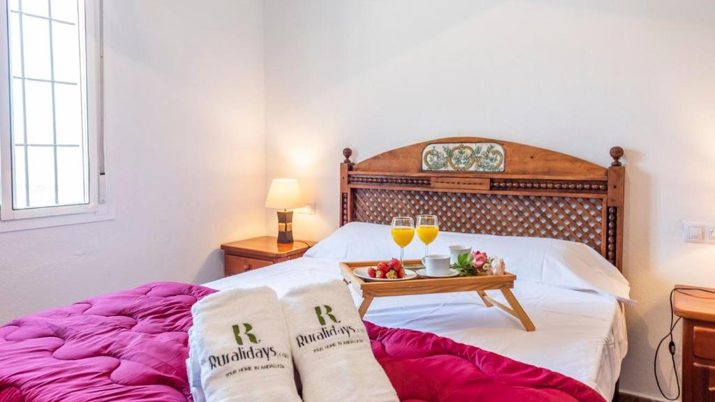 Łóżko lub łóżka w pokoju w obiekcie Casa El Olimpo Alora by Ruralidays