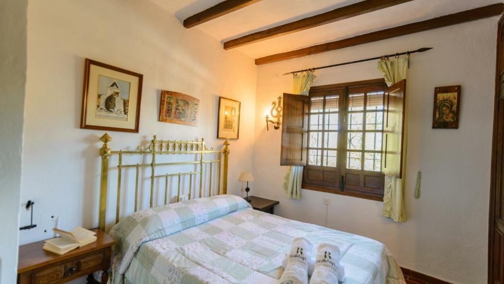 Postel nebo postele na pokoji v ubytování Casa El Rosario Ronda by Ruralidays