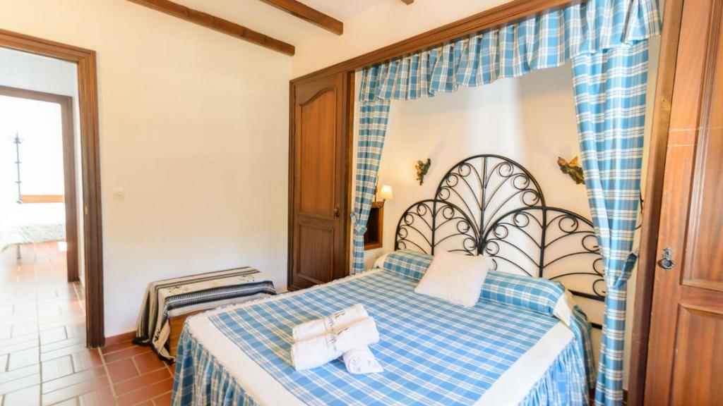 Postel nebo postele na pokoji v ubytování Casa El Rosario Ronda by Ruralidays