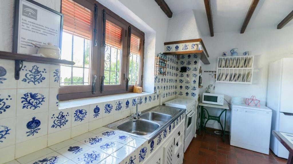 Kuchyň nebo kuchyňský kout v ubytování Casa El Rosario Ronda by Ruralidays