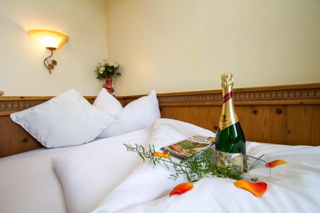 Letto o letti in una camera di Hotel Metzgerwirt