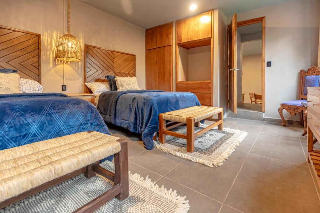 Postel nebo postele na pokoji v ubytování Casa Lavanda Hotel Boutique