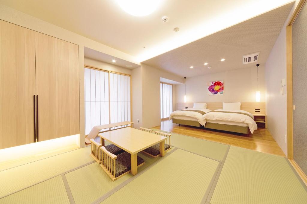 Postel nebo postele na pokoji v ubytování Hotel Gran Ms Kyoto