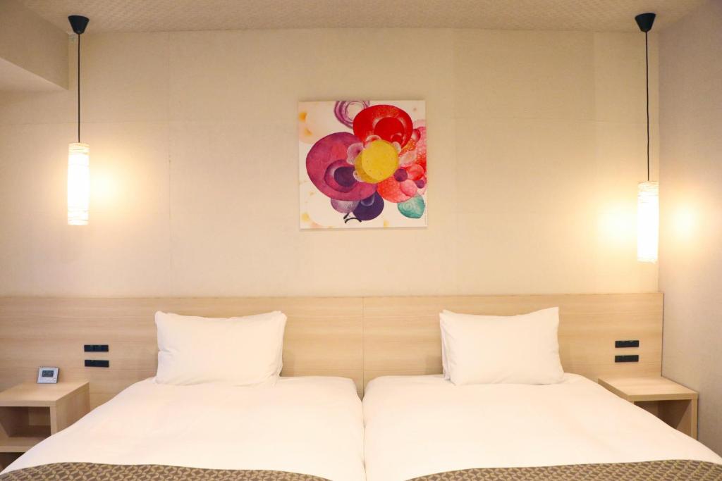 Postel nebo postele na pokoji v ubytování Hotel Gran Ms Kyoto
