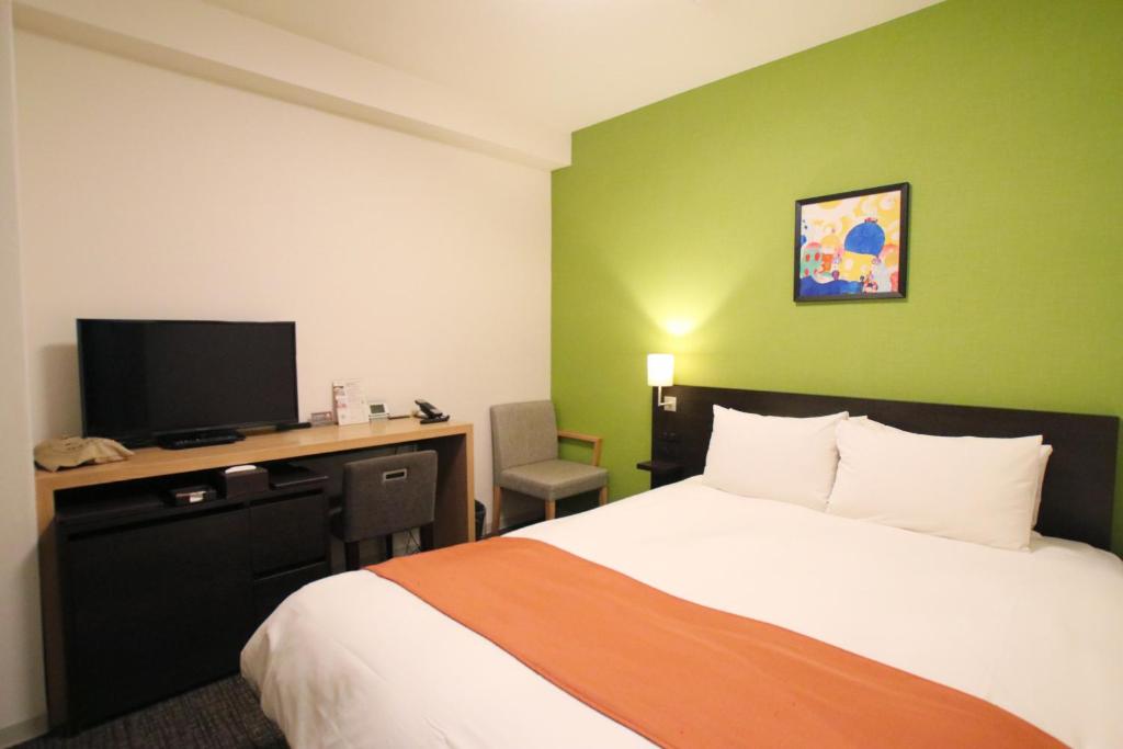 Postel nebo postele na pokoji v ubytování Hotel Gran Ms Kyoto