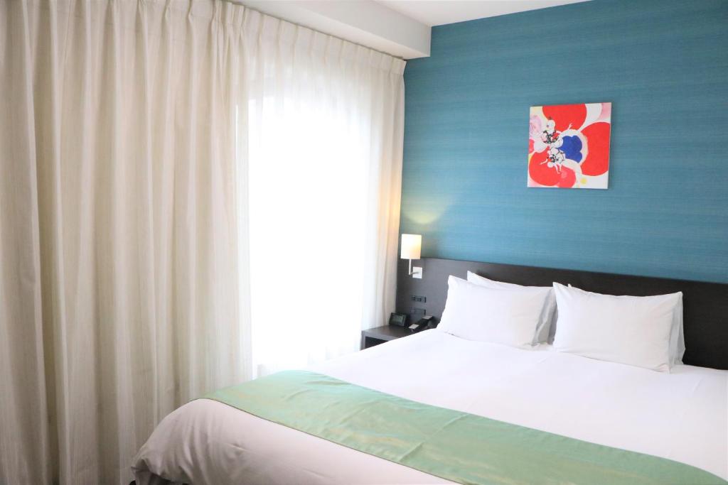 Postel nebo postele na pokoji v ubytování Hotel Gran Ms Kyoto