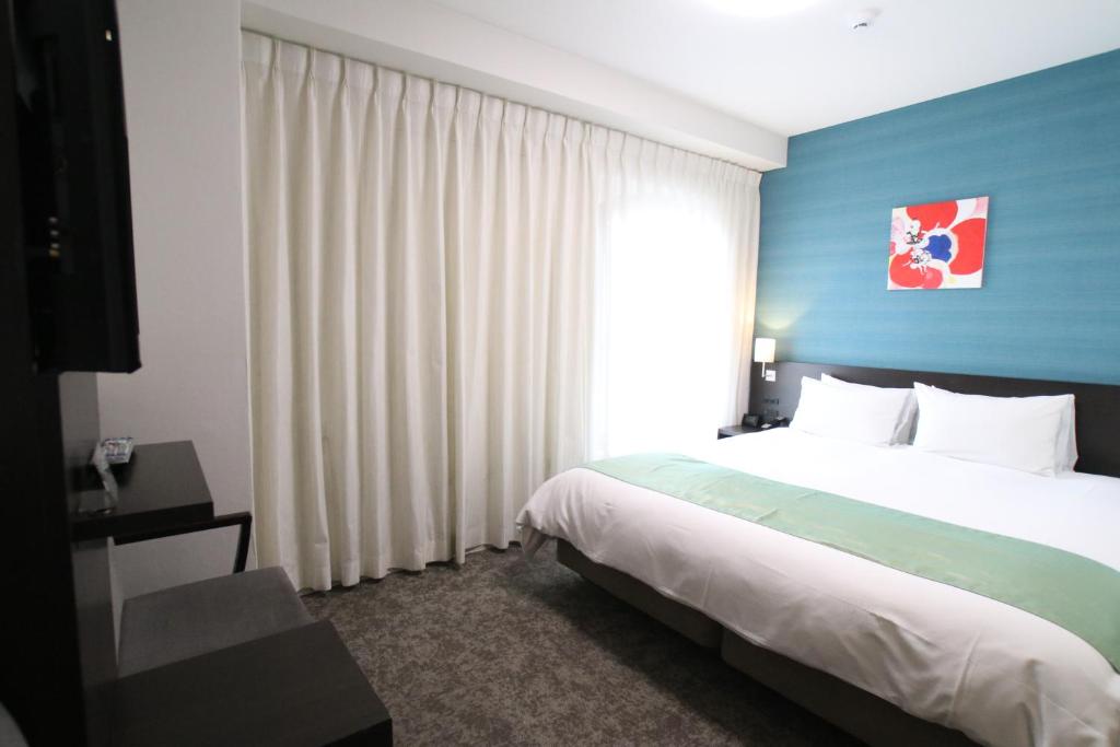 Postel nebo postele na pokoji v ubytování Hotel Gran Ms Kyoto