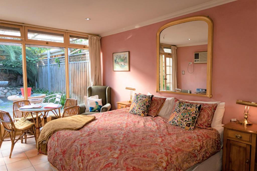 Krevet ili kreveti u jedinici u objektu North Adelaide Heritage Cottages & Apartments