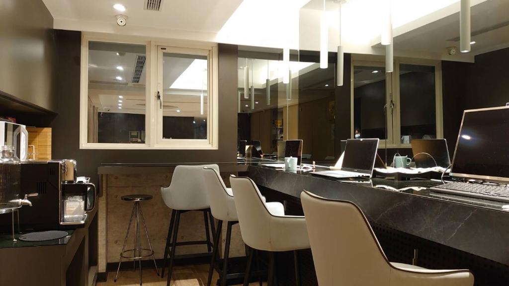 Kuchyň nebo kuchyňský kout v ubytování Hub Hotel Ximen Inn