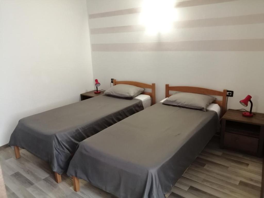 Postel nebo postele na pokoji v ubytování App Isabel