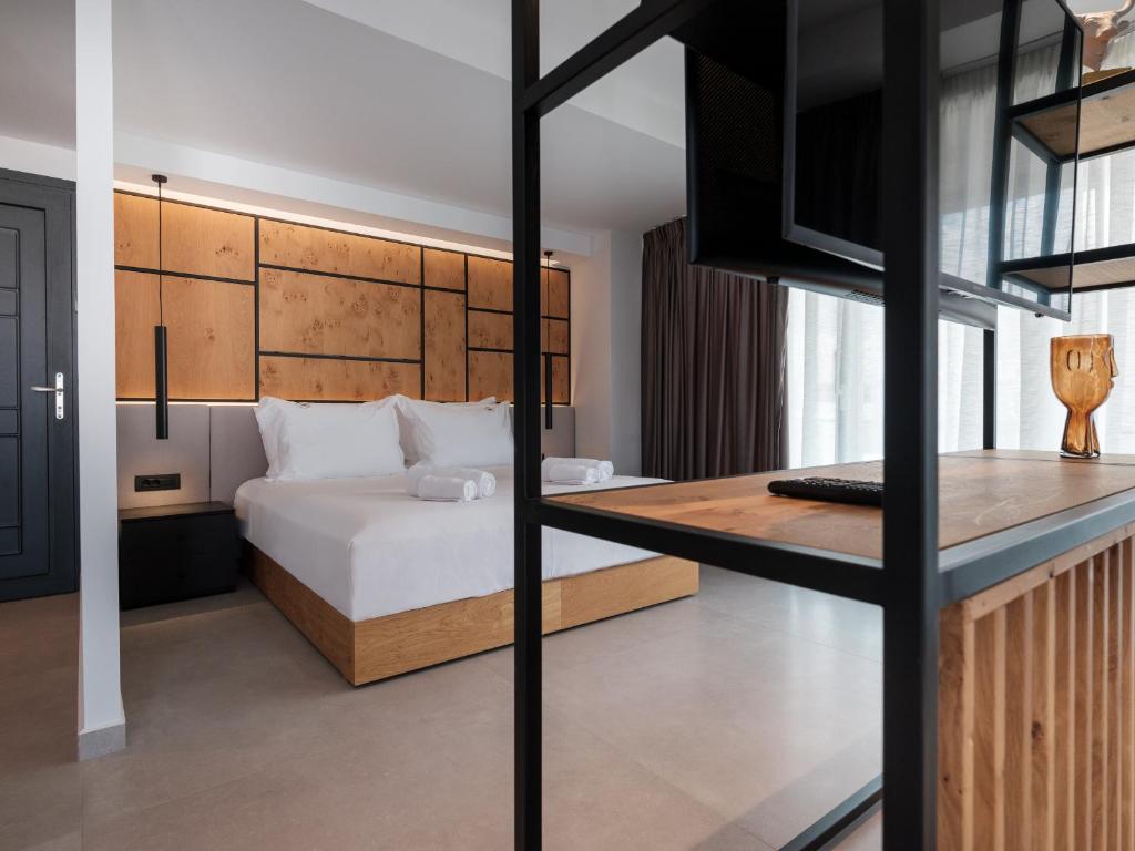 Łóżko lub łóżka w pokoju w obiekcie Sigma59 Dine & Stay