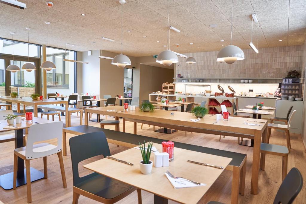 Un restaurant sau alt loc unde se poate mânca la Gasthof Maxlhaid