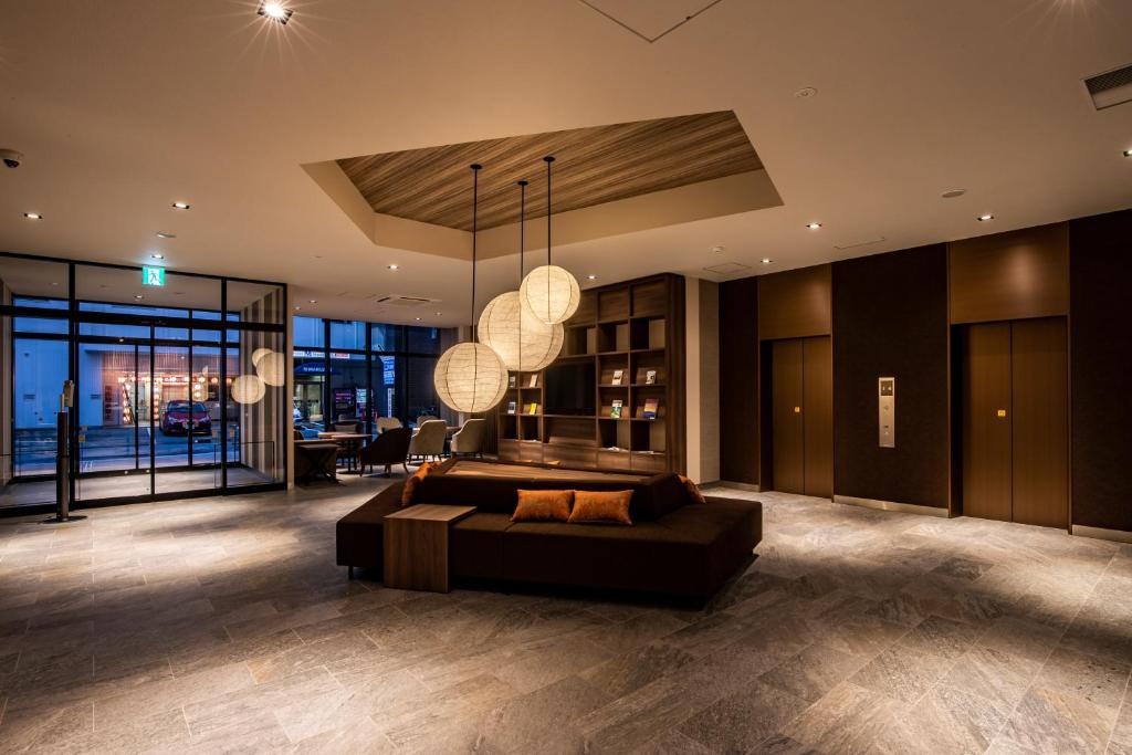Posezení v ubytování Tabino Hotel lit Matsumoto Milky white Onsen