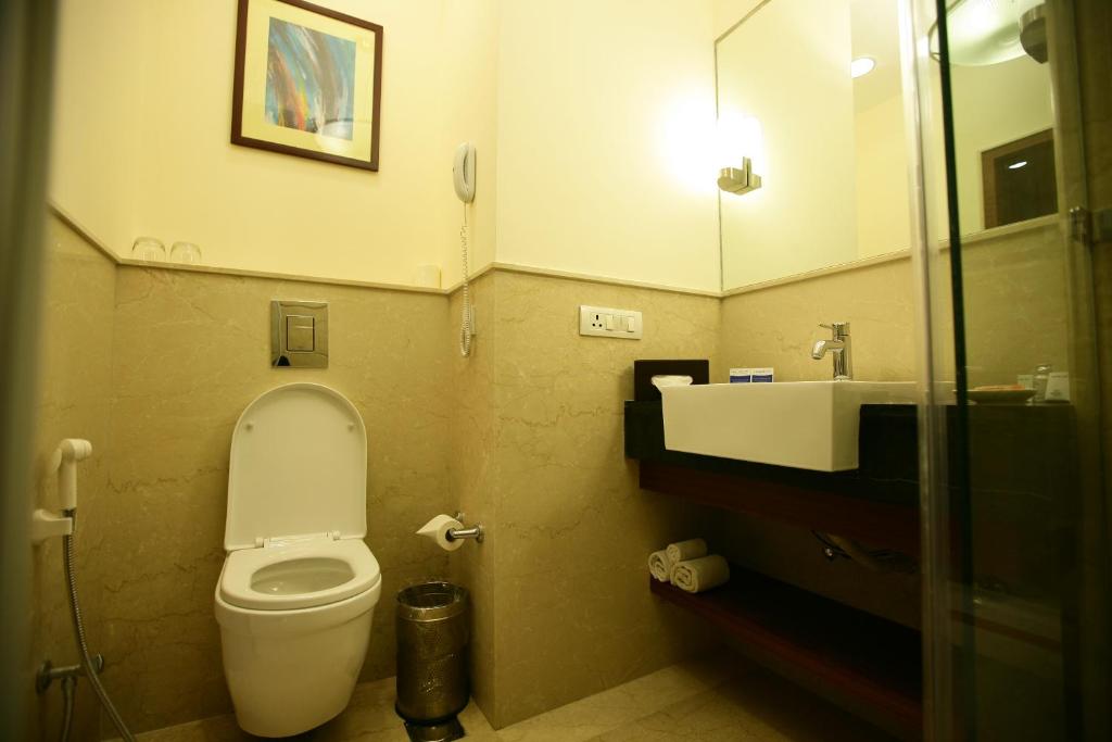 Koupelna v ubytování Muse Sarovar Portico Nehru Place