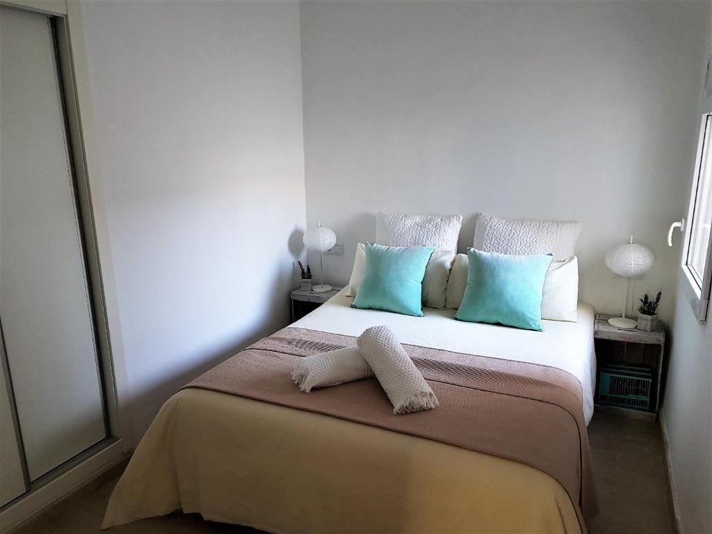 A bed or beds in a room at Casa Chelimen