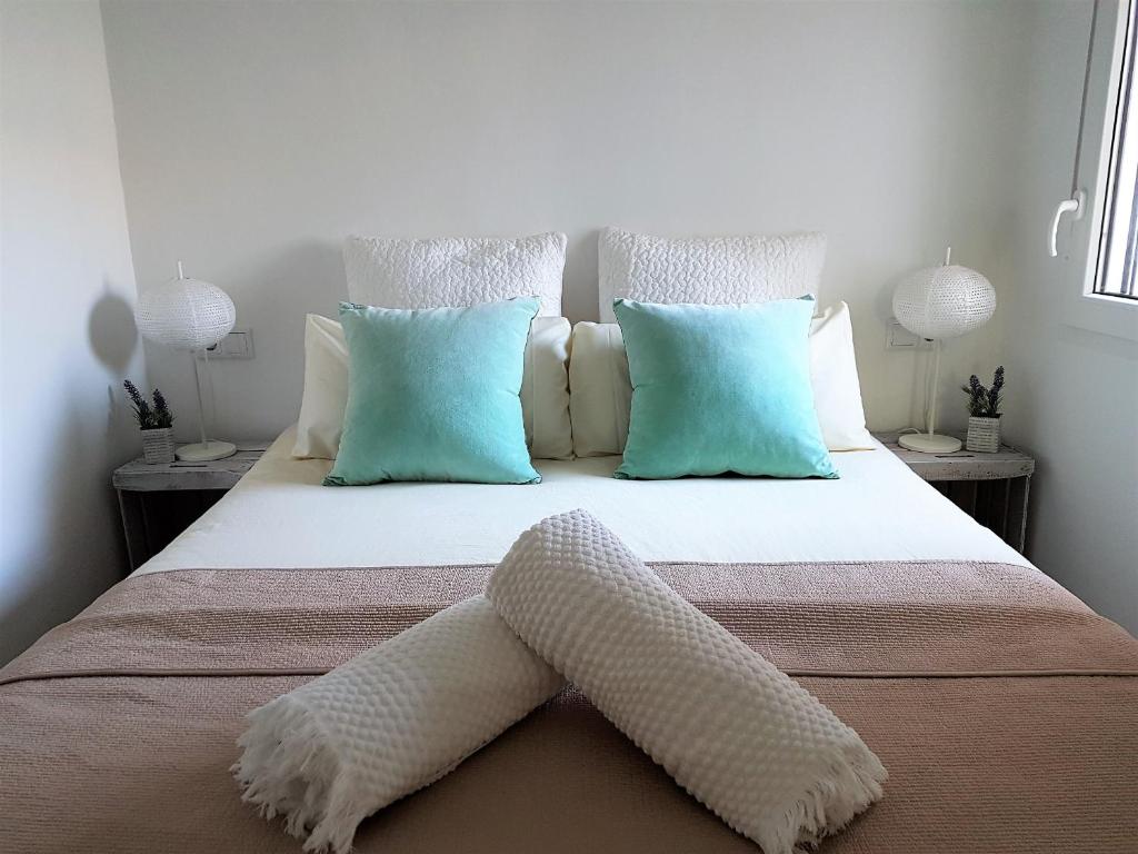 A bed or beds in a room at Casa Chelimen