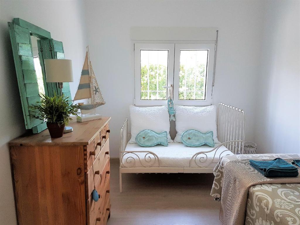 A bed or beds in a room at Casa Chelimen
