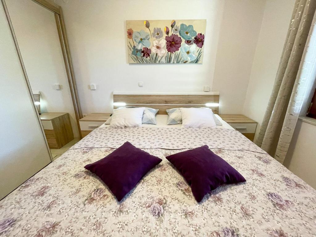 Postel nebo postele na pokoji v ubytování Apartman Zlata