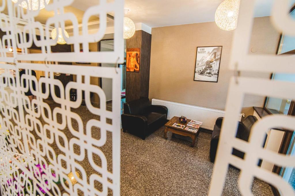 Postel nebo postele na pokoji v ubytování Hotel Class