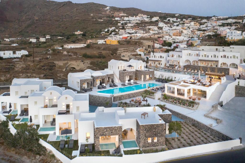 an aerial view of a resort with white buildings at Secret View Hotel in Oia