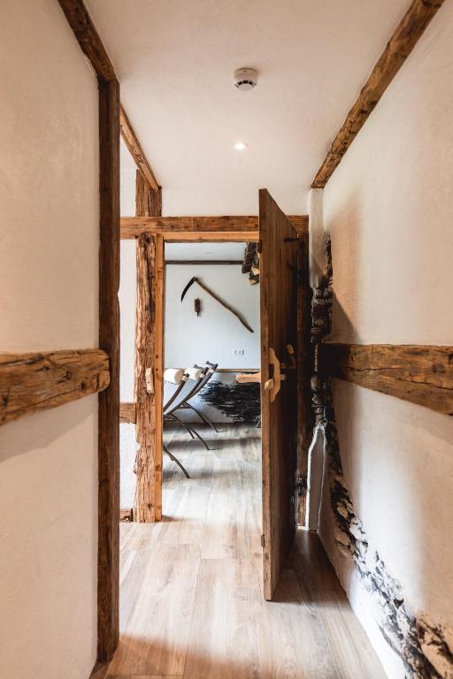 Postel nebo postele na pokoji v ubytování Gästehaus Tauernhaus