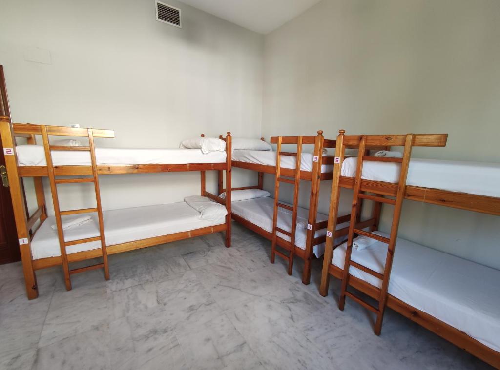 Poschodová posteľ alebo postele v izbe v ubytovaní New Samay Hostel