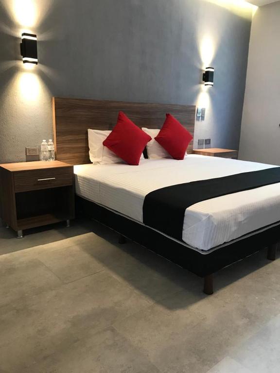 Postel nebo postele na pokoji v ubytování Hotel y Spa Posada Mirador