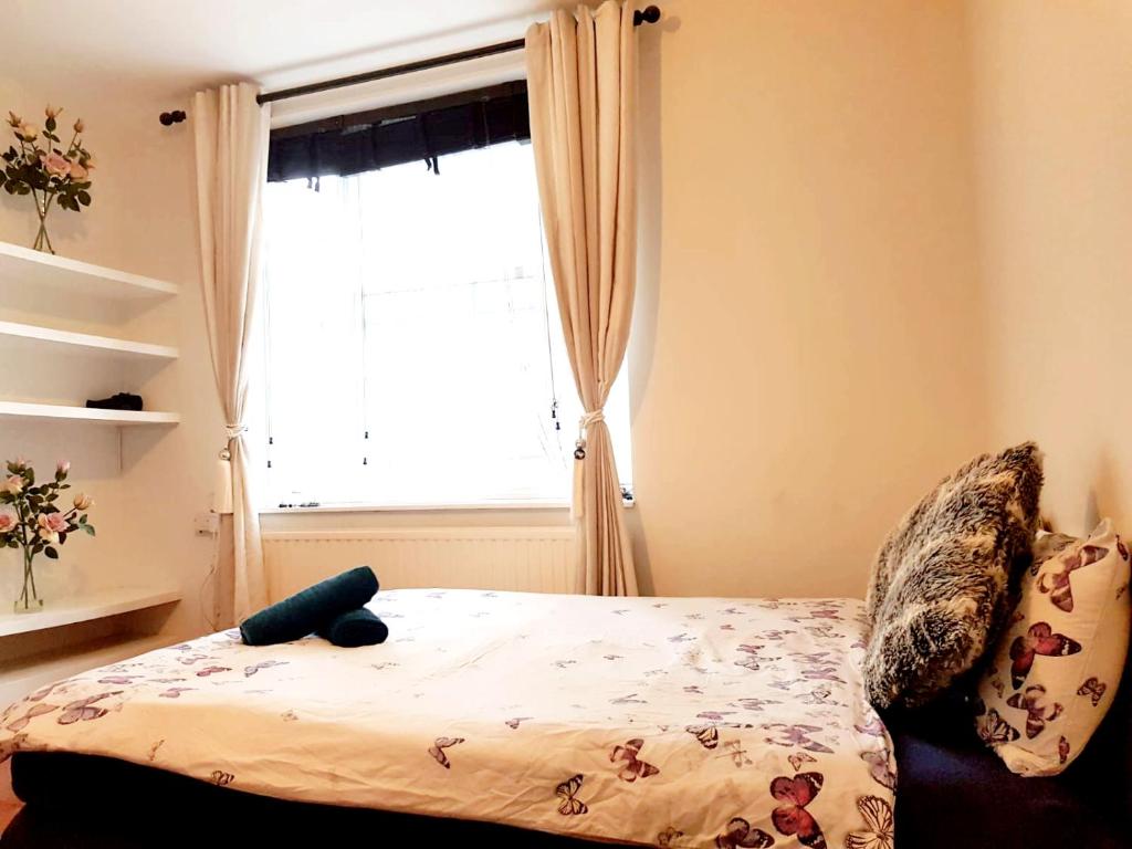 Кровать или кровати в номере Waterloo Rooms