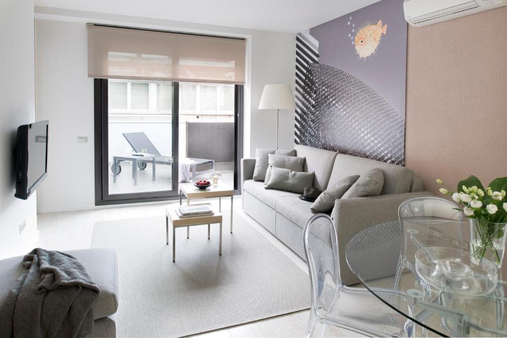 TV a/nebo společenská místnost v ubytování Eric Vökel Boutique Apartments - BCN Suites