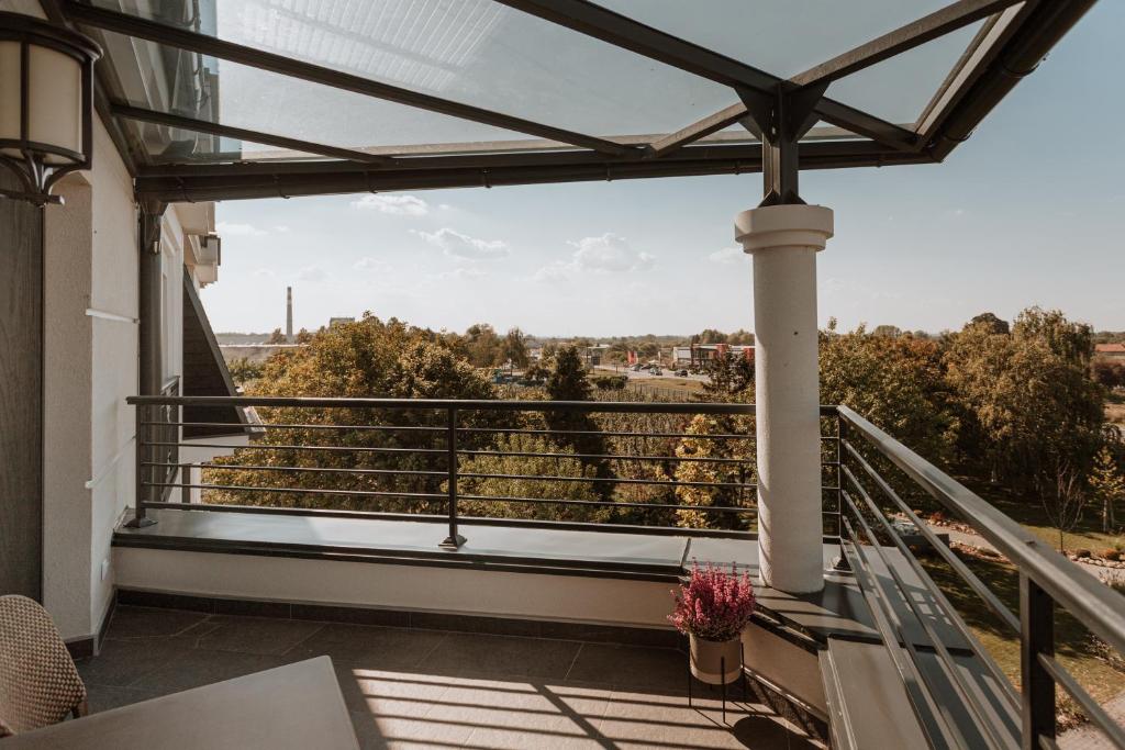 Balkón nebo terasa v ubytování Hotel Divine Park