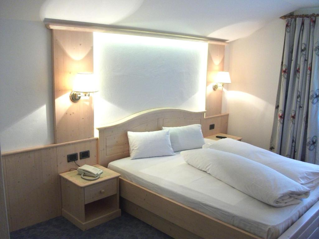 Postel nebo postele na pokoji v ubytování Hotel Schwarzbachhof