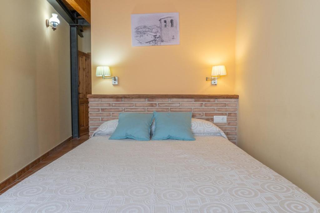 Postel nebo postele na pokoji v ubytování Casa El Centro