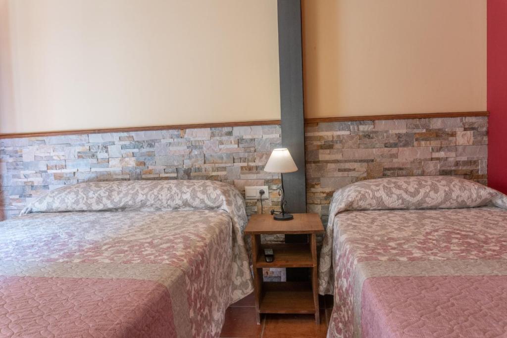 Postel nebo postele na pokoji v ubytování Casa El Centro