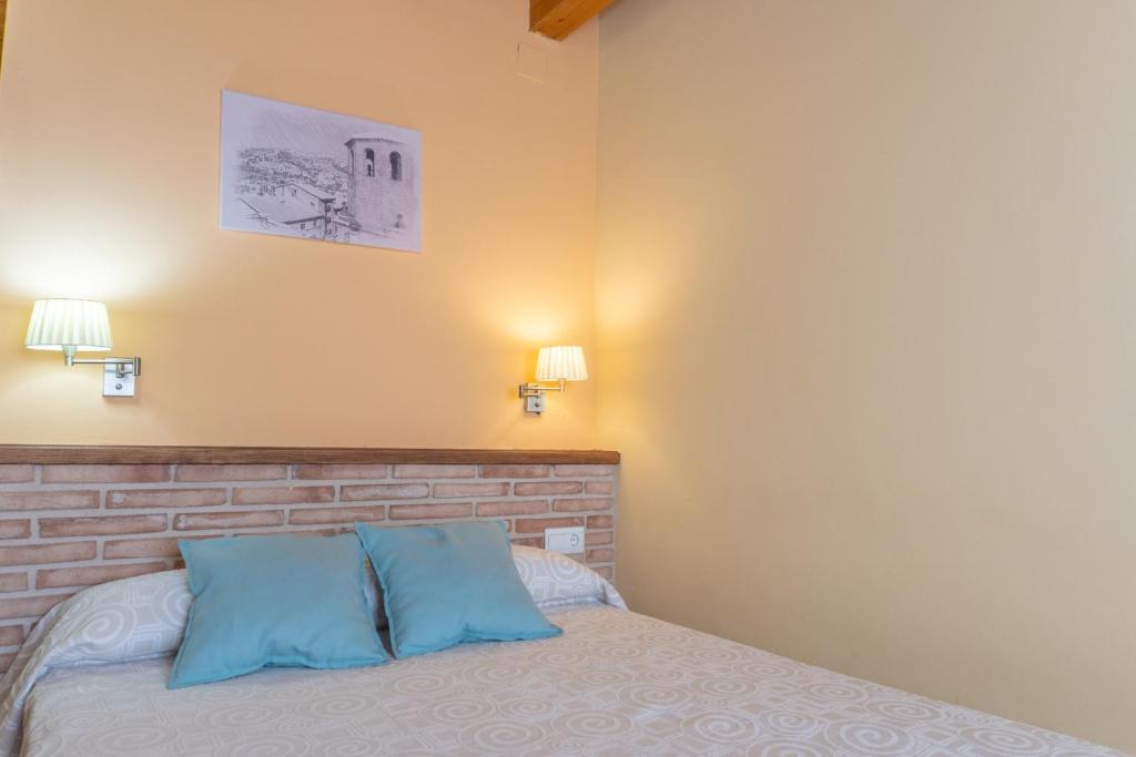 Postel nebo postele na pokoji v ubytování Casa El Centro
