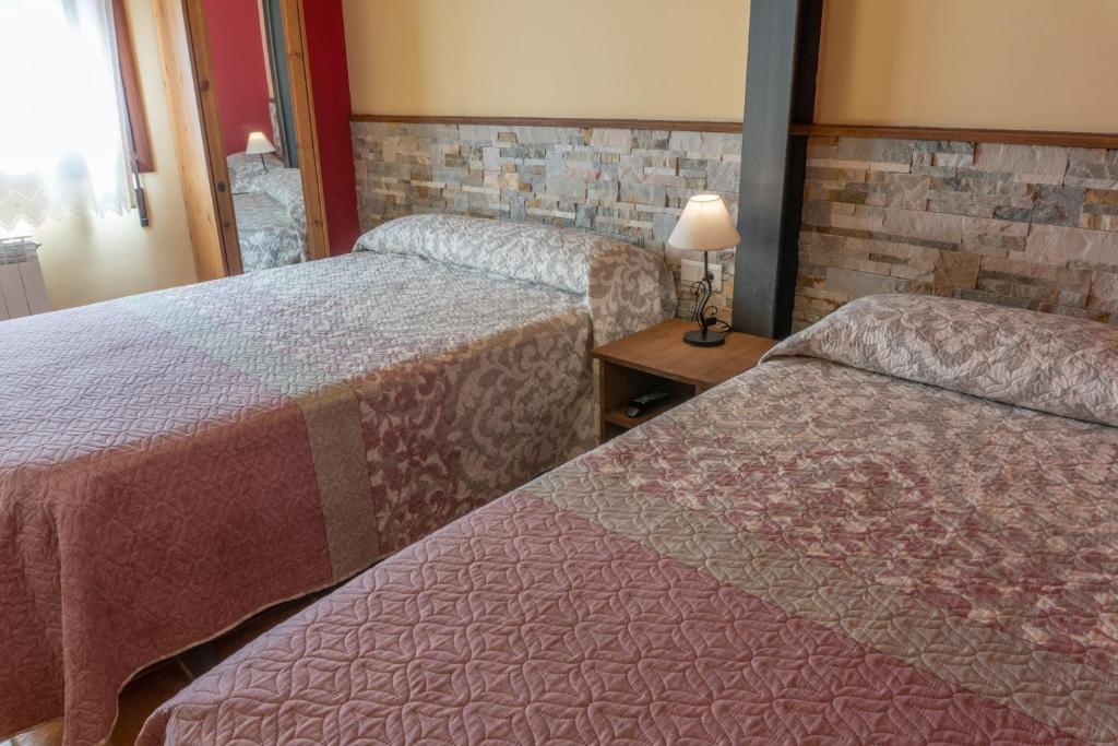 Postel nebo postele na pokoji v ubytování Casa El Centro