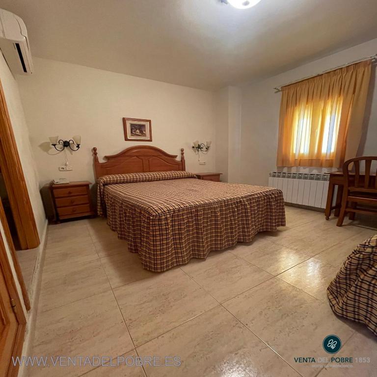 Łóżko lub łóżka w pokoju w obiekcie Hotel Venta del Pobre