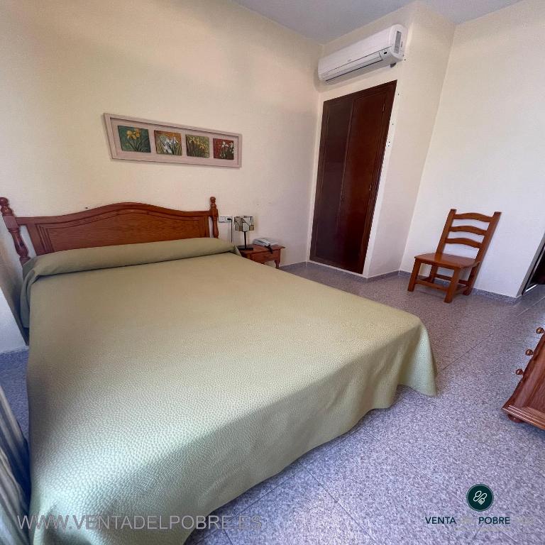 Łóżko lub łóżka w pokoju w obiekcie Hotel Venta del Pobre