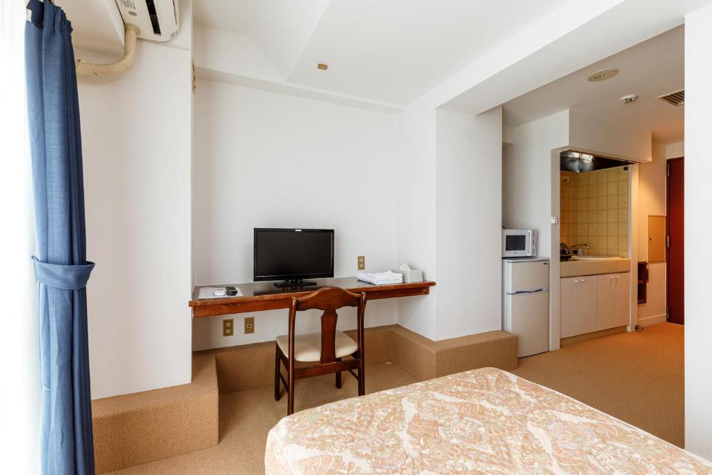 Kuchyň nebo kuchyňský kout v ubytování Hotel WWJ