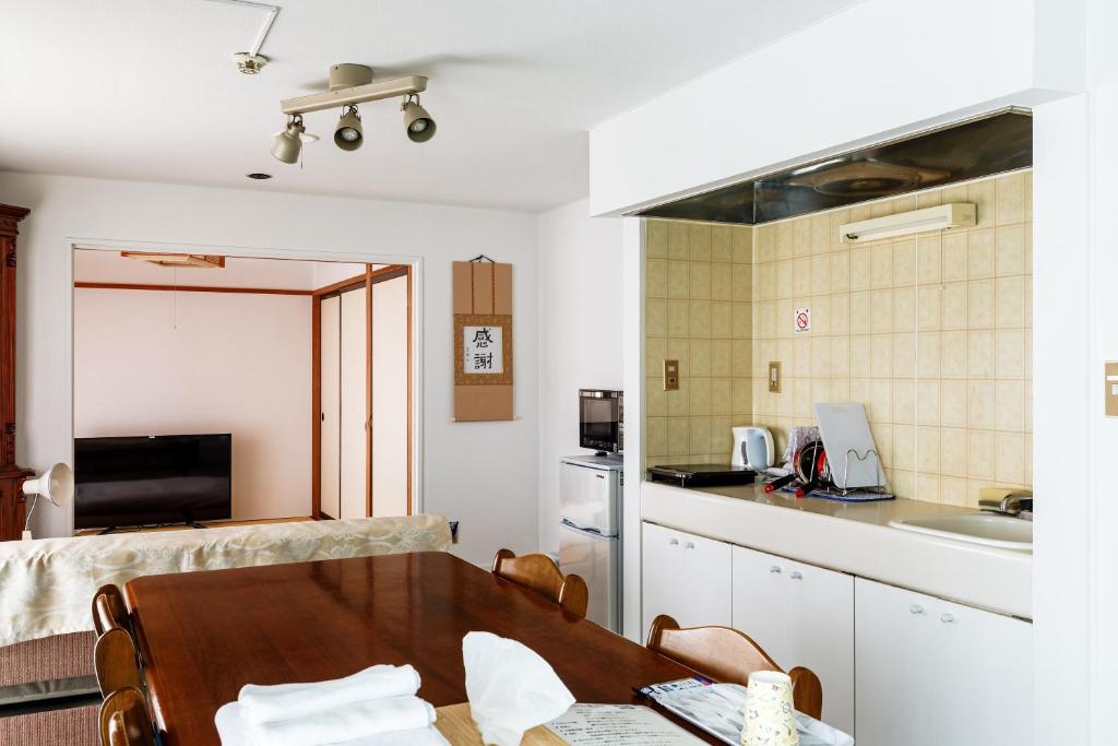 Kuchyň nebo kuchyňský kout v ubytování Hotel WWJ