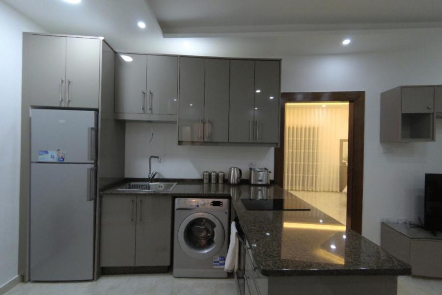 Kuchyň nebo kuchyňský kout v ubytování Executive Apartments
